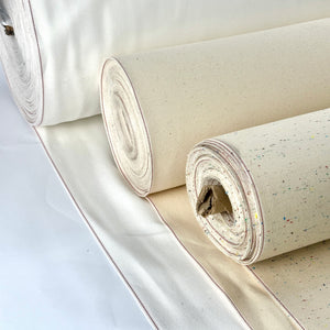 White, natural and confetti nep selvedge denim rolls