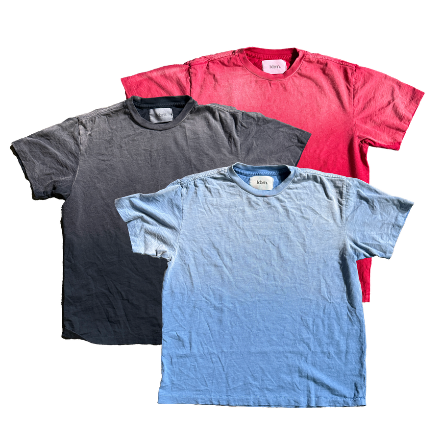 Sprayed and Washed 20' Single Slub KBM T-Shirt in Baby Blue, Washed Cherry, and Washed Black