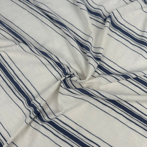 Cotton slub jersey with navy stripes, swirled to show drape