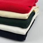 Heavy cotton 2x1 rib knit fabric for collars, cuffs and waistbands, folded stack