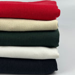 Heavy cotton 2x1 rib knit fabric by the yard, stack of colors: red, cream, hunter green, white and black