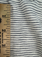 Pinstripe spacing against a ruler, about six stripes per inch
