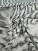 Navy pinstripe cotton slub jersey, close-up swirl