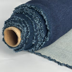 Roll of indigo cotton double knit with light gray back