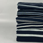 Stack of six indigo jersey knits: stripes and slub