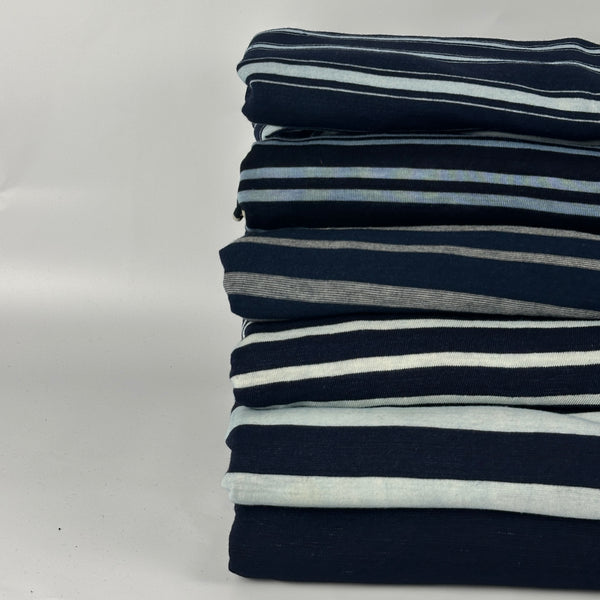 Stack of six indigo jersey knits: stripes and slub