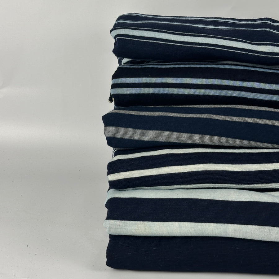 Stack of six indigo jersey knits: stripes and slub