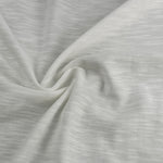 Supima slub jersey fabric draped, showing the thick-and-thin slub yarn