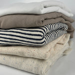 Lightweight French terry fabric by the yard, folded colors side view