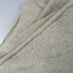 Oatmeal speckled lightweight French terry fabric, cream with blue flecks
