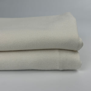 PFD cotton rib knit fabric, folded stack, prepared for dye